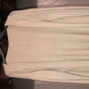 Cream cardigan with asymmetrical sides